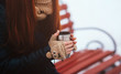 © estradaanton - Winter. Woman drinking hot tea or coffee with iron insulated cup