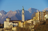 Fototapeta  - The old center of Belluno among the Dolomites.