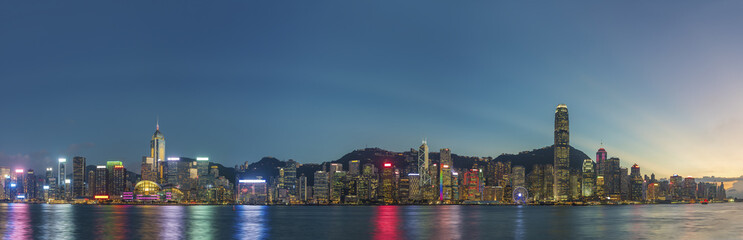 Poster - Panorama of Victoria Harbor in Hong Kong city at dusk