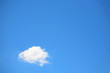 Single cumulous cloud on a blue sky