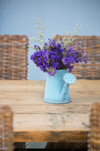 Blue tin watering flower pot