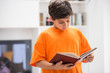 © Jasmin Merdan - Kid with book at home