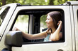 © LStockStudio - Young Woman Enjoying a Car Ride