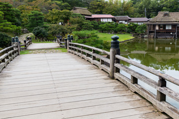 Canvas Print - Japanese garden with wooden bridge