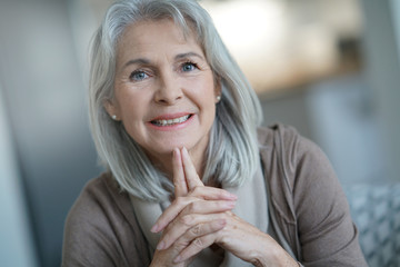 Wall Mural - Portrait of beautiful senior woman with white hair