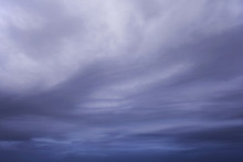 Blue Purple Clouds With White Gleams And Soft Wavy Texture