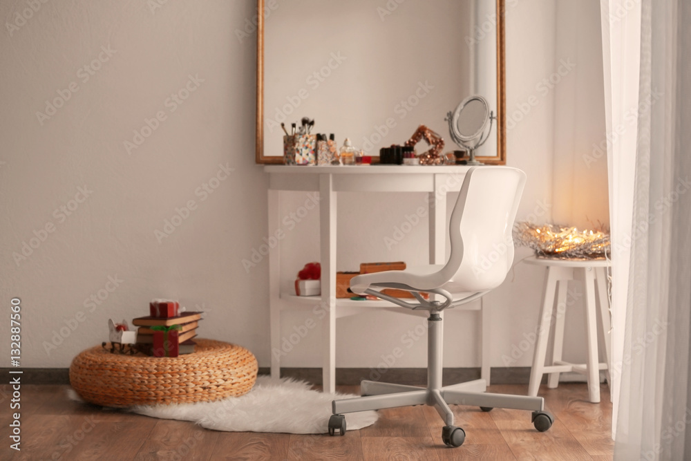 Cosmetics on table in room interior