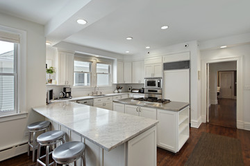 Kitchen with stove-top island