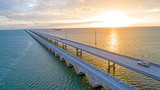 Overseas Highway Seven Mile Bridge Traffic at Sunrise. View From Florida Keys Tropical Road to Paradise