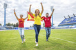 © Lumi Images - Group of soccer fans celebrating with Spanish flag