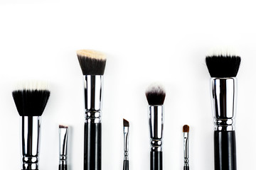 Makeup brushes on white background