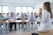© Lumi Images - Female doctor explaining medication in training class