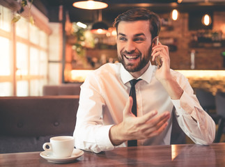 Poster - Handsome businessman in cafe