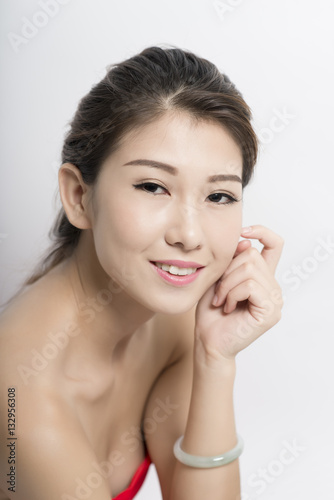 Young Woman Looking At Camera With A Seductive Smile Buy This Stock