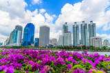 Fototapeta Nowy Jork - Cityscape image of Benchakitti Park at blue sky background in Bangkok, Thailand.