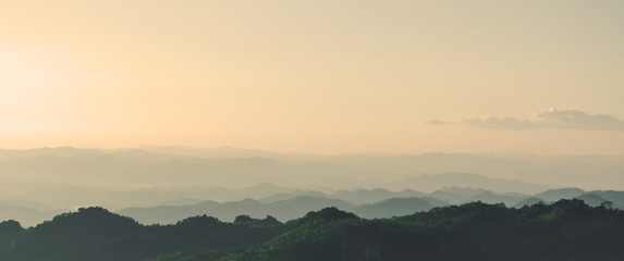 Wall Mural - sunrise sky and misty layer mountain in the morning at sri nan national park thailand
