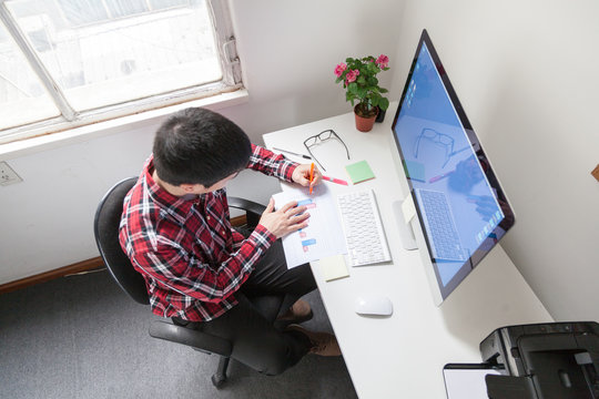 Young man working at office
