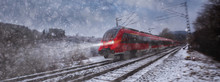 Red Train Speeding In The Snow