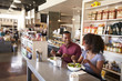 © Monkey Business - Couple Enjoying Lunch Date In Delicatessen Restaurant