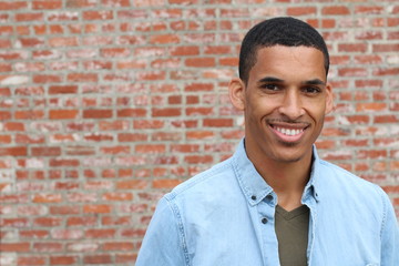 Wall Mural - Happy Mixed Race Male Smiling Portrait with Copy Space 