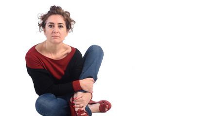 Wall Mural - Woman crouching on a white background