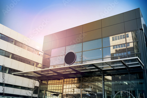 Fotografía Blank black round signage mockup, modern business building