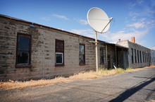 Old Building With Satellite Dish     