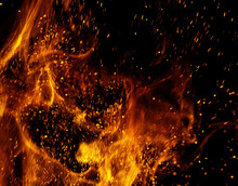 Fire Flames With Sparks On A Black Background