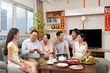 © DragonImages - Enjoying Tet with family