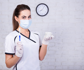 Wall Mural - dentist woman with teeth model and toothbrush