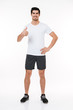 © Drobot Dean - Full length portrait of a fitness man showing thumbs up