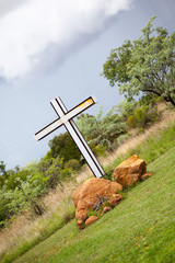 Christian Cross Wedged in African Rocks