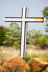 Christian Cross Wedged in African Rocks