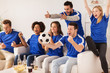 © Syda Productions - friends or football fans watching soccer at home