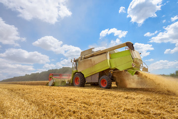 Aufkleber - A combine harvester at work on a field in Bulgaria.