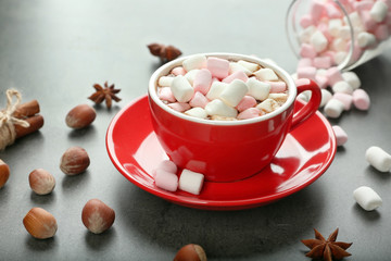 Poster - Cup of hot cocoa with marshmallows on color background