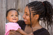 © digitalskillet1 - African American teenage mother and her daughter.