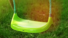 SLOW MOTION: Empty Swings In The Summer Afternoon