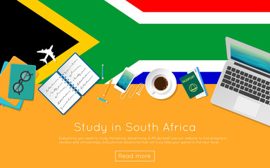 Wall Mural - Study in South Africa concept for your web banner or print materials. Top view of a laptop, books and coffee cup on national flag. Flat style study abroad website header.