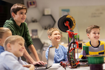 Wall Mural - happy children with 3d printer at robotics school