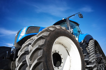 Poster - Crawler tractor working in field