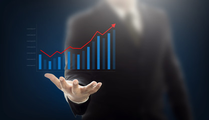 Poster - Businessman holding graph digital graphic on hand , business con