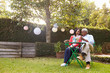 © Monkey Business - Senior African American couple sitting in their back garden