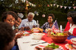 © Monkey Business - Happy multi generation black family at 4th July barbecue