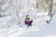 © Smile - Portrait of young smiling woman meditating on snow