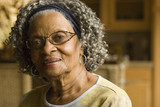 Fototapeta  - Portrait of an elderly African American woman at home.
