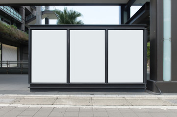 large blank billboard on a street wall, banners with room to add your own text