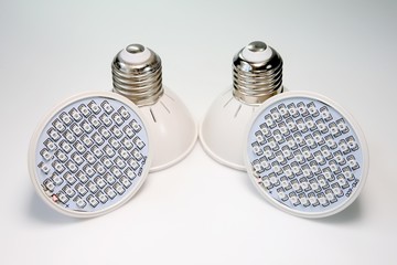 AC LED lamp on white board background.