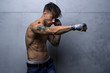 © David Prades-Photo/ADDICTIVE STOCK - Muscular fighter doing shadow fight