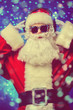 © Andrey Kiselev - Santa in sunglasses